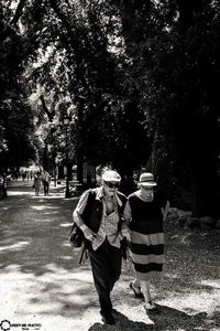 Rear view of woman walking in park