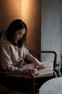 Woman studying at home