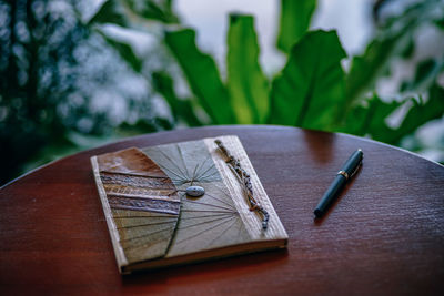 High angle view of clock on table