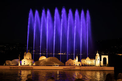 Panoramic view of illuminated buildings at night