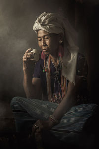 Portrait of young man looking away