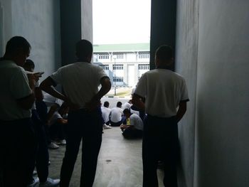 Men in corridor