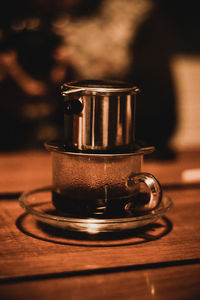 Close-up of coffee cup on table