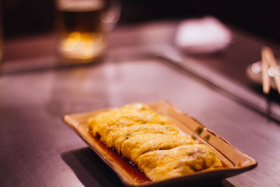 Close-up of served food on table