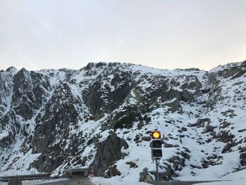 Snow covered mountain against sky