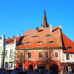 Low angle view of historical building against blue sky