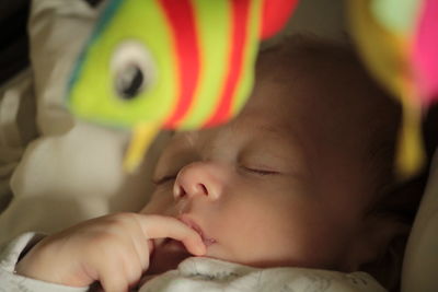 Close-up of cute baby boy sleeping