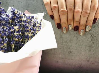 High angle view of woman holding umbrella