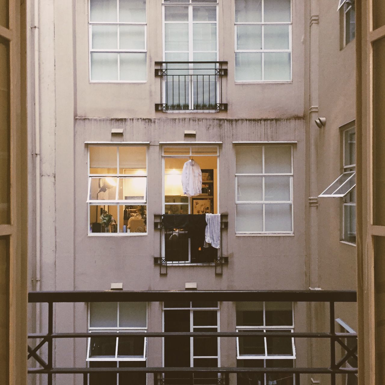 window, architecture, building exterior, built structure, glass - material, reflection, building, transparent, residential building, full frame, city, glass, residential structure, modern, day, balcony, backgrounds, low angle view, no people, indoors