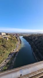 High angle view of river against clear blue sky