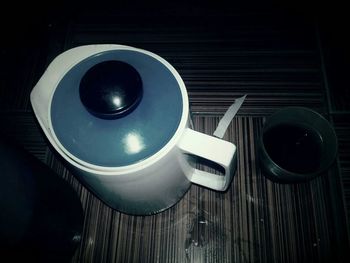 High angle view of coffee cup on table