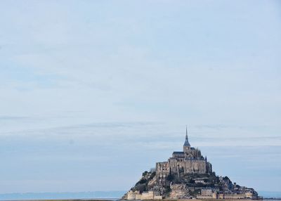 Historic mont saint-michel against sky