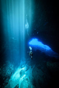 Person swimming in sea