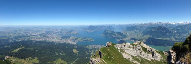 High angle view of mountain range against blue sky