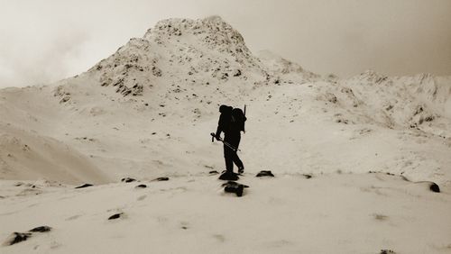 Full length of woman on mountain landscape