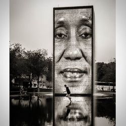 Reflection of woman in water