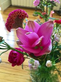 Close-up of pink flowers on table