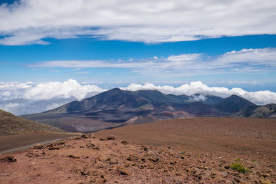 Scenic view of arid landscape against sky