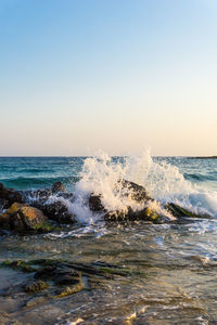 Scenic view of sea against clear sky