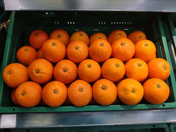 Close-up of oranges on table