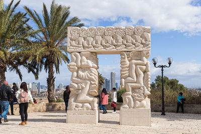 Group of people in front of historical building