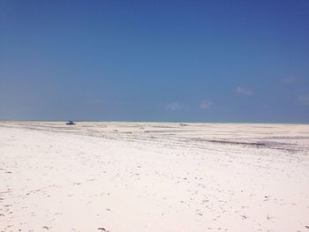 Scenic view of beach against clear sky