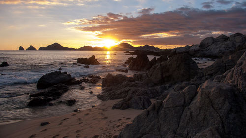 View of beach at sunset