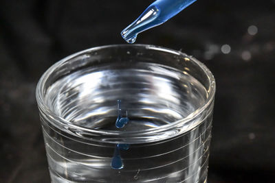 High angle view of drinking glass in water