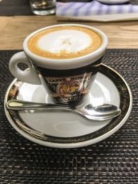 Close-up of coffee cup on table