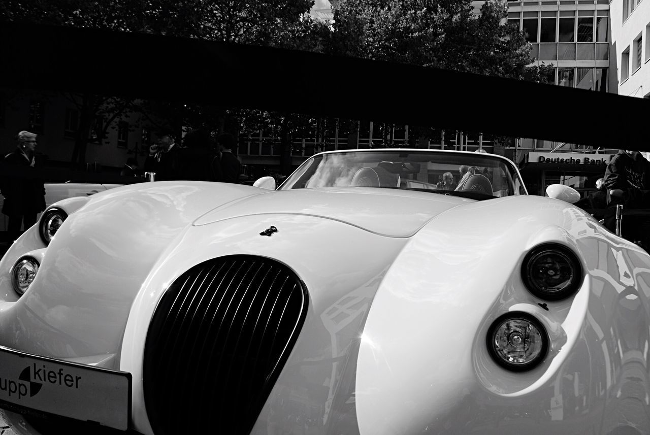 VINTAGE CAR PARKED ON STREET