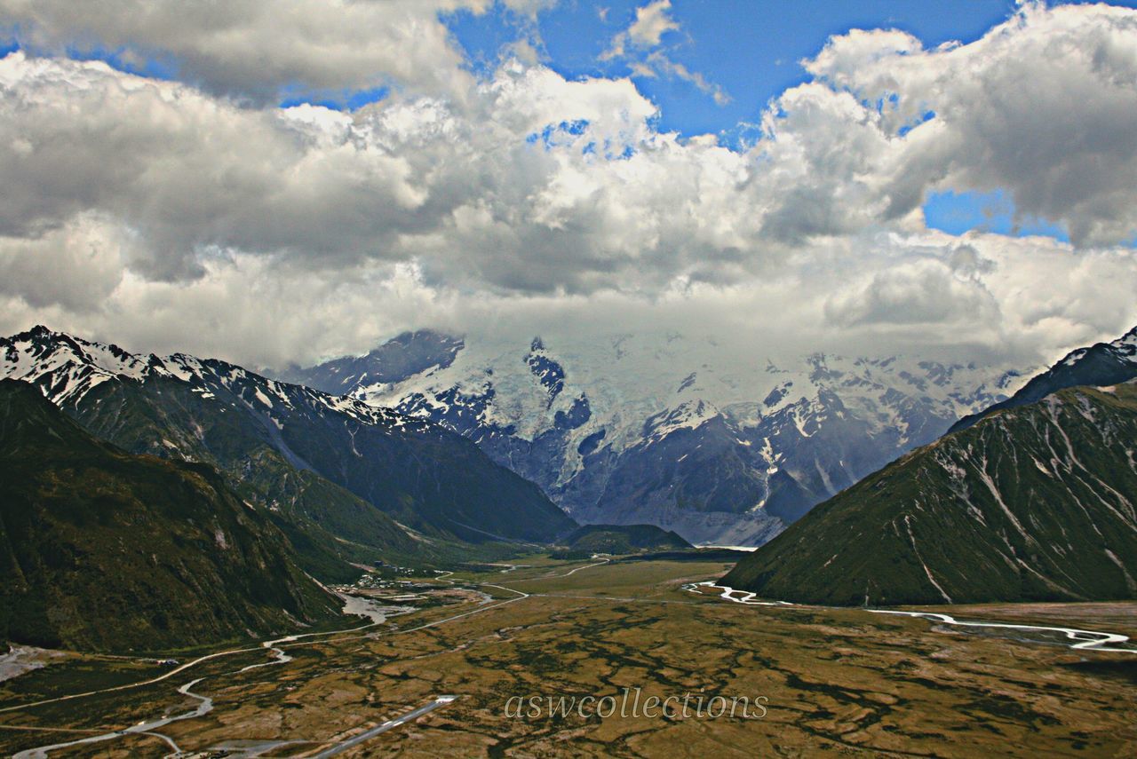 mountain, mountain range, snow, tranquil scene, scenics, winter, tranquility, beauty in nature, cold temperature, sky, snowcapped mountain, landscape, cloud - sky, nature, season, weather, non-urban scene, cloud, idyllic, cloudy