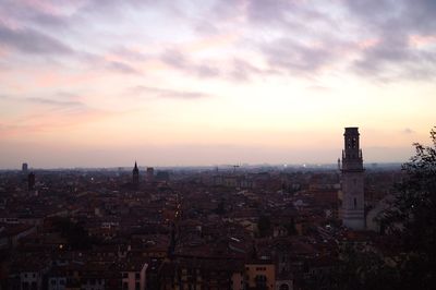 Cityscape against sky during sunset