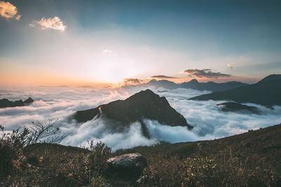 Scenic view of mountains against sky during sunset