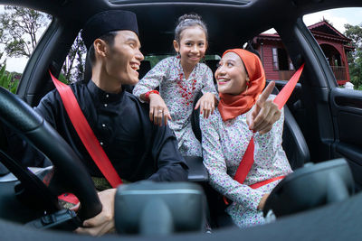 Group of people in car