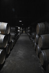 Row of wine bottles in container