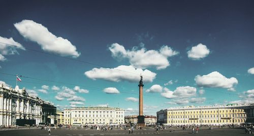 Road against blue sky in city