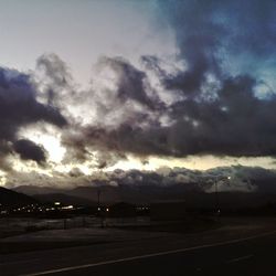 Scenic view of landscape against cloudy sky