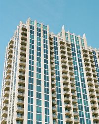 Low angle view of modern building against clear sky