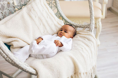 Cute baby sleeping on bed