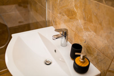 High angle view of faucet in bathroom