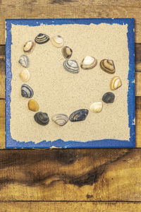 High angle view of coins on table