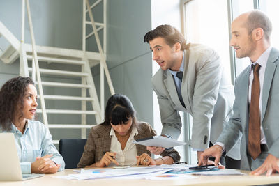 Business colleagues working at office