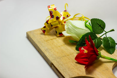 High angle view of rose bouquet on white table