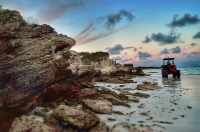 Scenic view of sea against cloudy sky