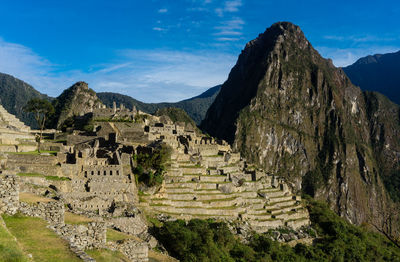 Old ruins on mountain against sky