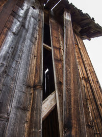 Low angle view of old wooden house