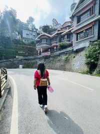 Rear view of lady in hills