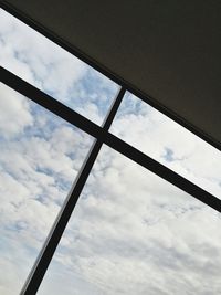 Low angle view of sky seen through window