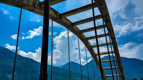 Low angle view of built structure against mountains