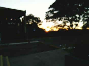 Close-up of road against sunset sky